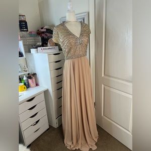 Terani Couture Gold and Cream Evening Gown. Stunning!Matching bag available.